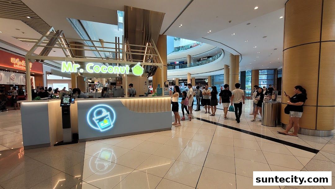 Mr. Coconut shop front with customers queuing in a modern shopping mall.