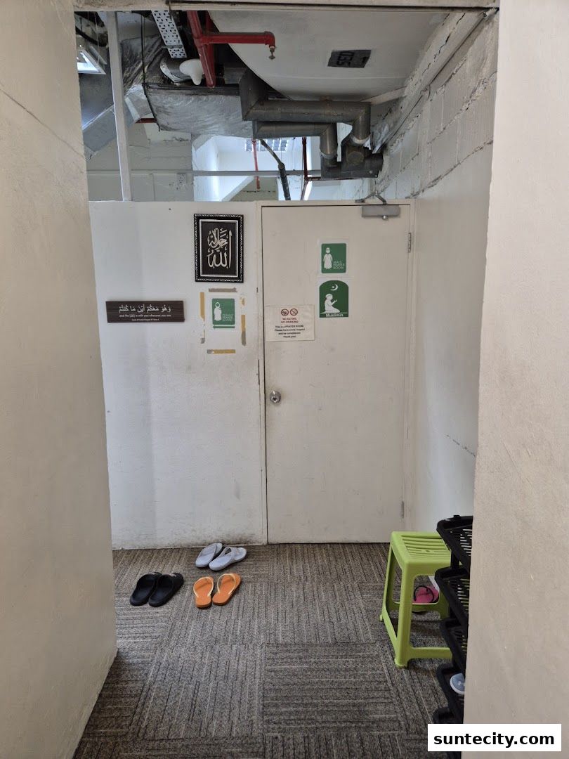 Entrance to a prayer room with slippers neatly arranged outside.