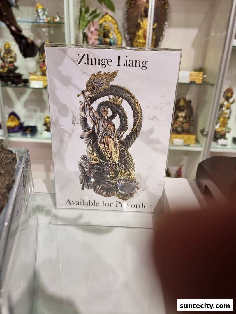 A display card for Zhuge Liang statue, available for pre-order, in a shop.