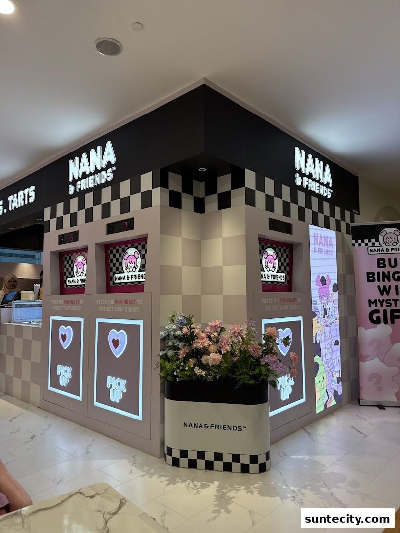 The exterior of Nana and Friends Cafe, featuring its distinctive branding and pick-up stations.