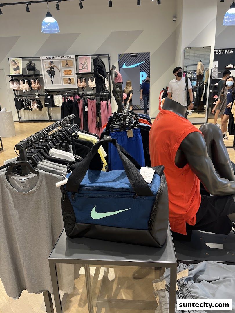 Interior view of a Nike store showcasing athletic apparel and accessories.