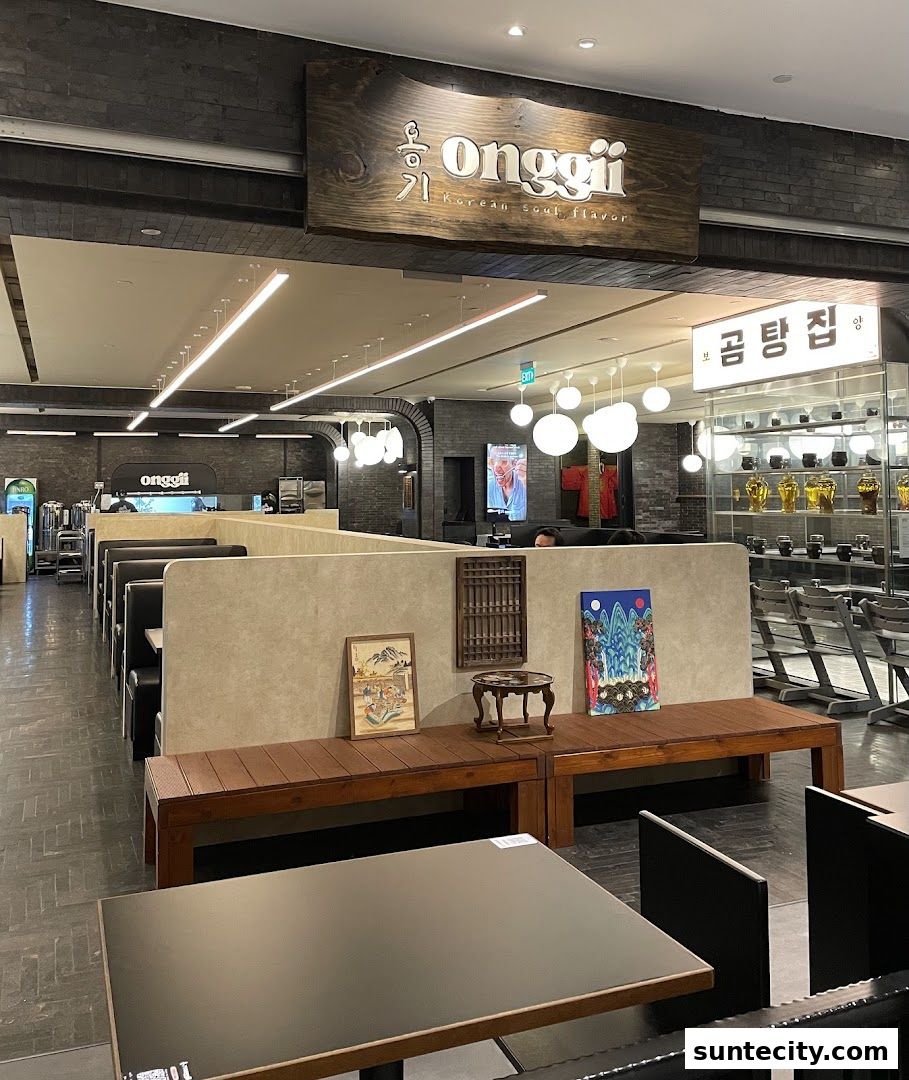 Interior view of Onggii Korean restaurant with seating and decor.