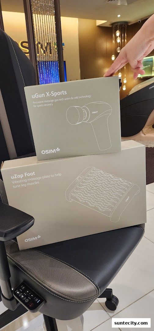 OSIM massage products, uGun X-Sports and uZap Foot, displayed on a massage chair.