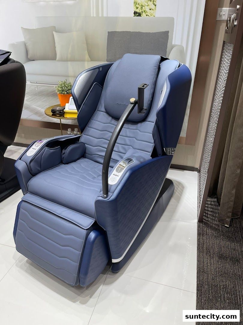 A luxurious blue massage chair is displayed in a retail store setting.