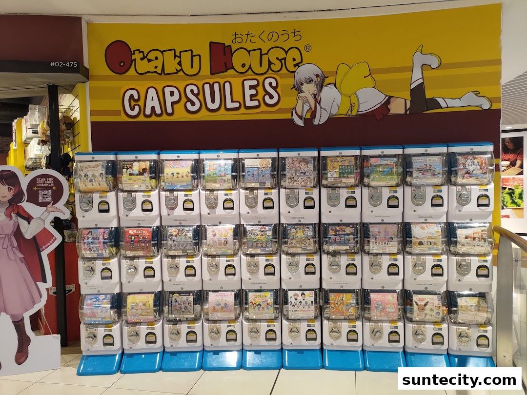 Otaku House Capsules shop front with rows of gachapon machines and anime-themed decor.