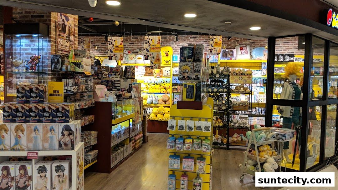 Interior view of Otaku House shop filled with anime figures, plush toys, and merchandise.