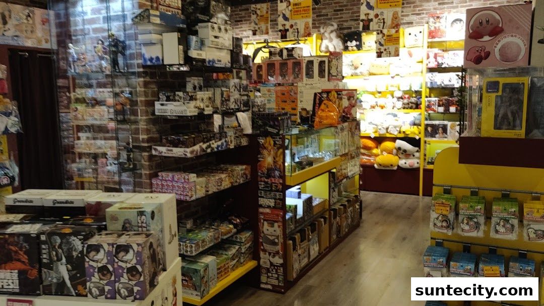 Interior view of Otaku House shop filled with anime figures, plush toys, and merchandise.