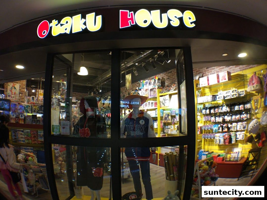The storefront of Otaku House, a shop filled with anime merchandise and collectibles.