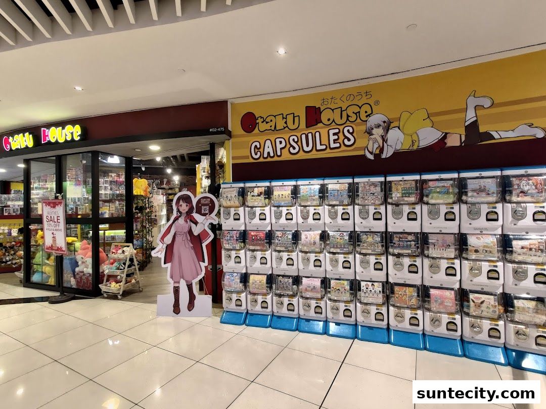 Otaku House shop front with anime merchandise and a wall of capsule toy machines.