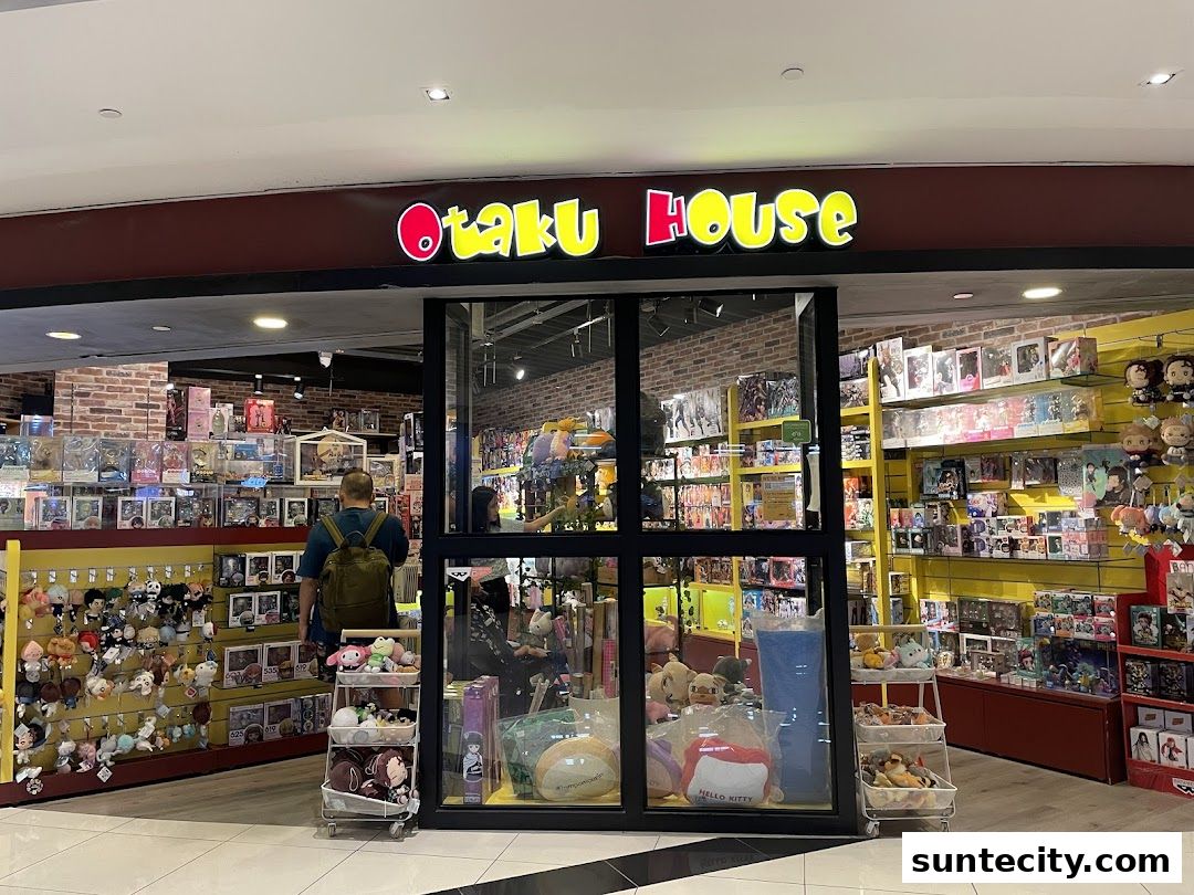 The Otaku House shop front displays a wide variety of anime merchandise and collectibles.