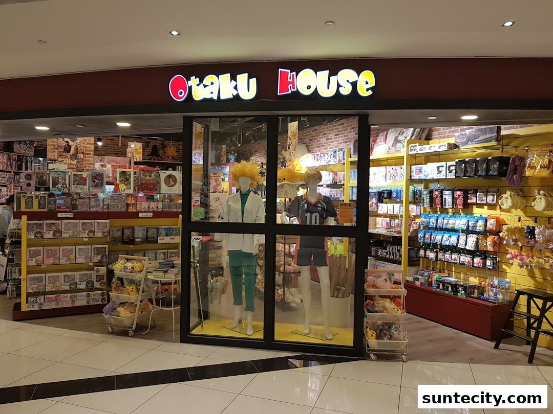 The Otaku House shop front displays anime figures, merchandise, and mannequins in a brightly lit retail space.