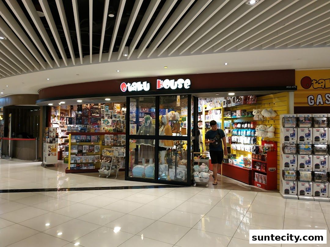 The Otaku House shop front displays anime merchandise, plush toys, and collectibles.