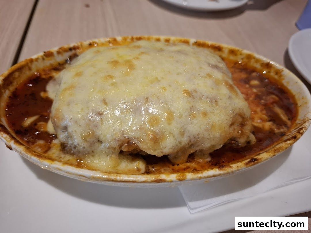 A close-up shot of a delicious-looking lasagna dish with melted cheese.