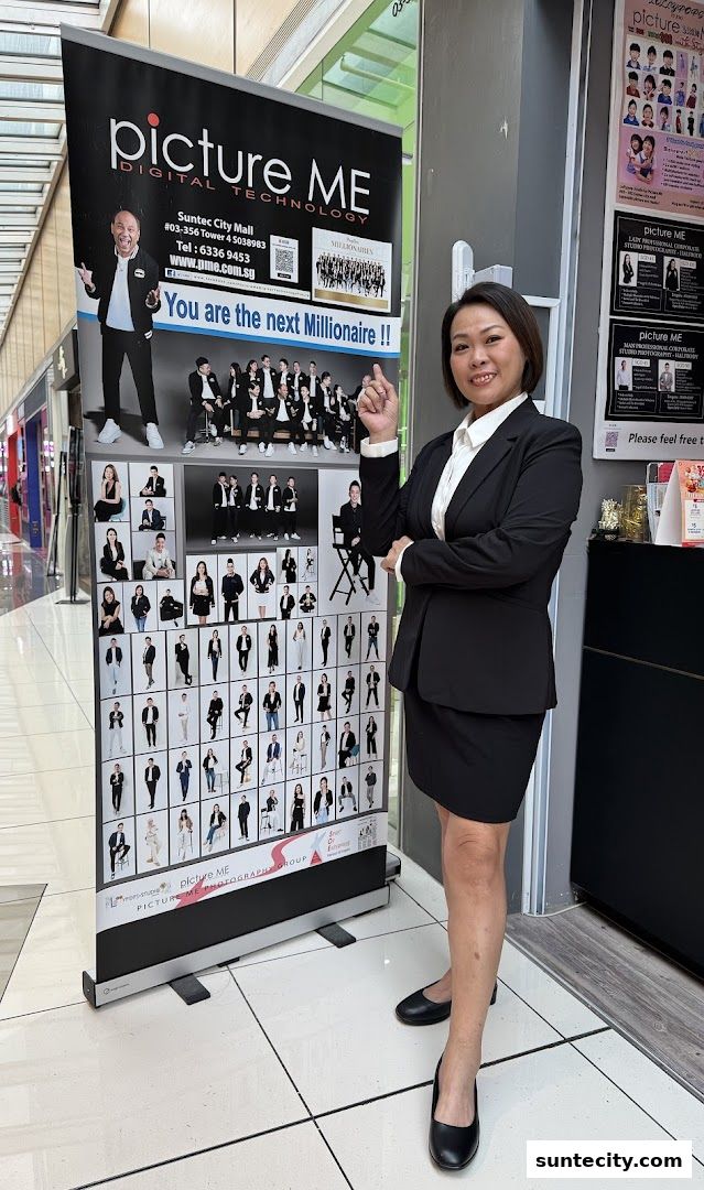A woman in a suit stands next to a banner showcasing various portrait photography examples.