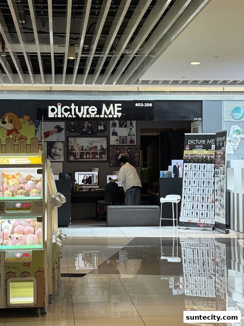 The 'Picture Me' digital technology shop with photography displays and a claw machine.