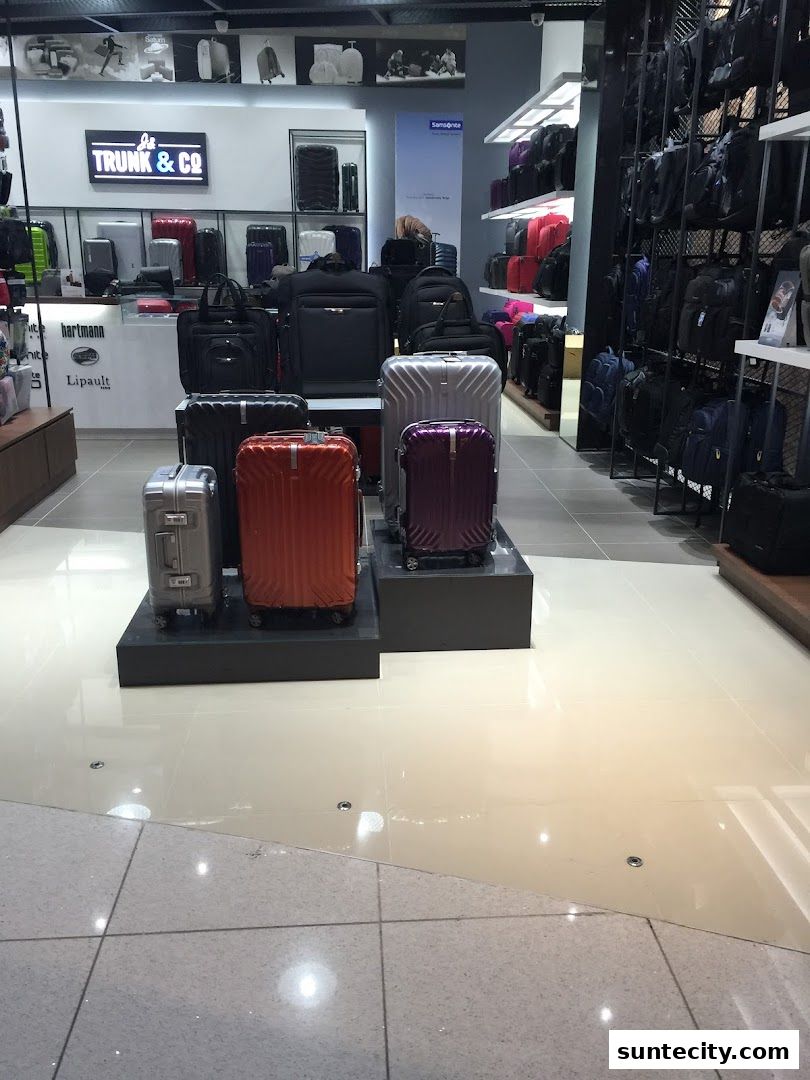 Interior view of a Samsonite store showcasing various luggage and bags.