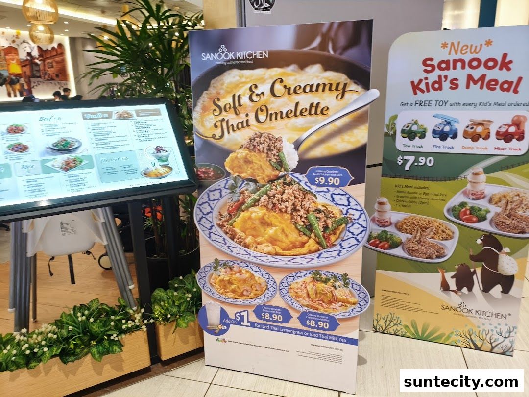 Promotional posters for Sanook Kitchen featuring Thai omelette and kid's meals.