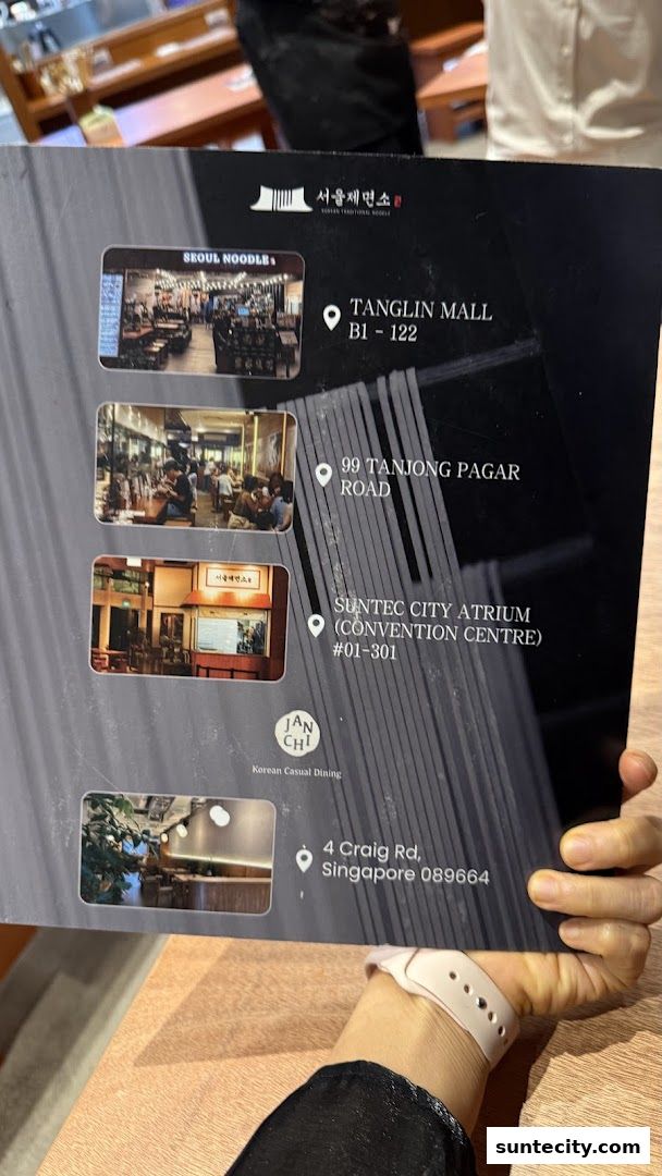 A brochure showcasing Seoul Noodle Shop's locations and interior.