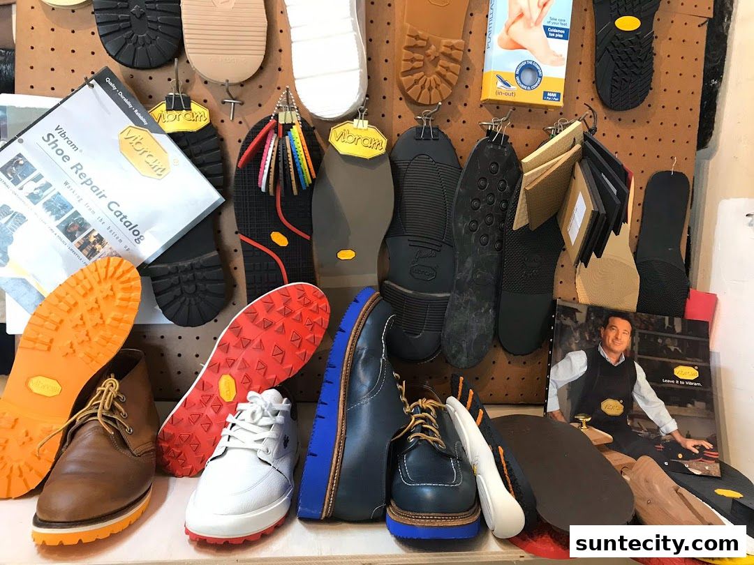 A display of various shoe soles and shoe repair materials, including a catalog and shoes.