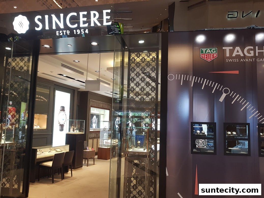 The entrance of Sincere Fine Watches, showcasing luxury timepieces and brand displays.