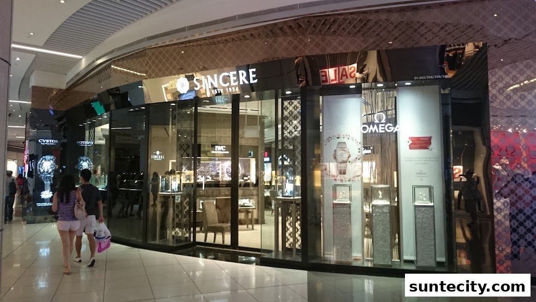 The exterior of Sincere Fine Watches, showcasing luxury timepieces and brands like Omega and IWC.