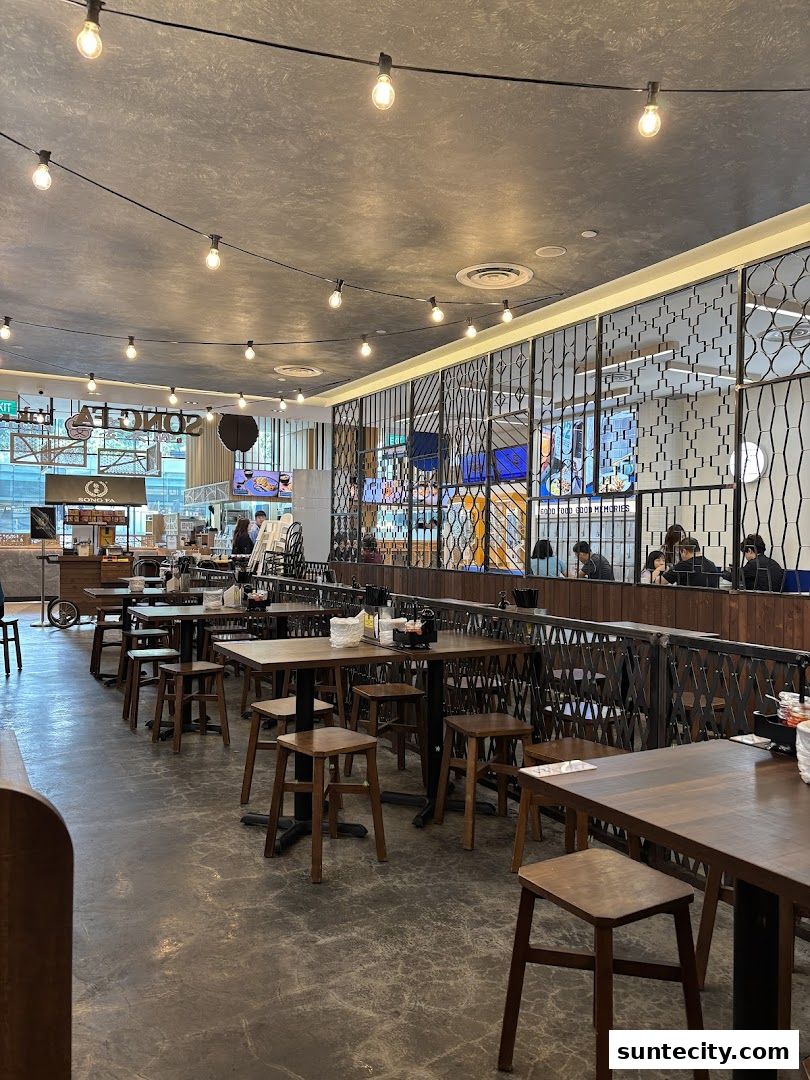 Interior view of Song Fa Bak Kut Teh restaurant with tables and chairs.