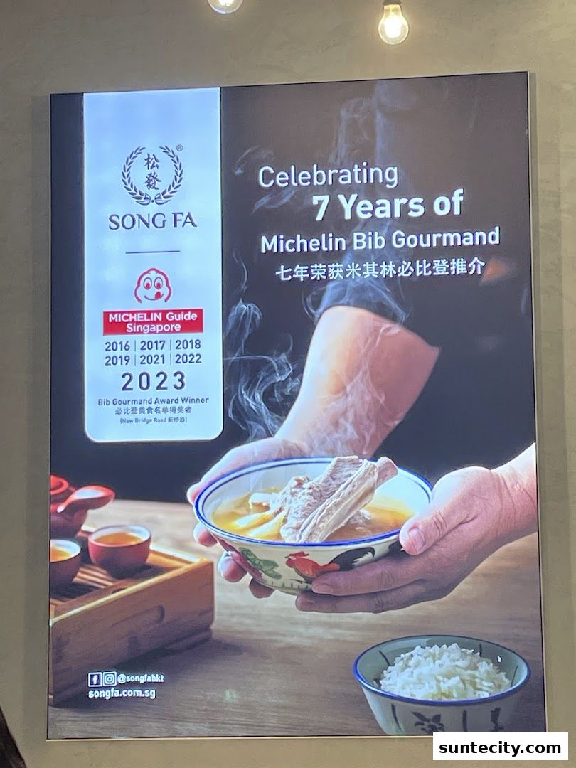 A poster celebrating Song Fa Bak Kut Teh's 7 years of Michelin Bib Gourmand recognition.