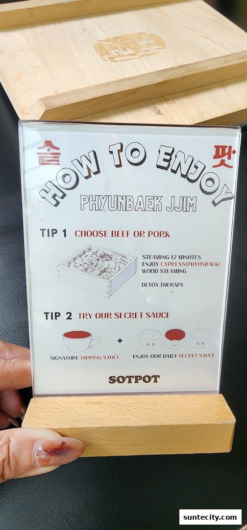 A sign from SOTPOT explaining how to enjoy Phyubak Jjim with two tips.