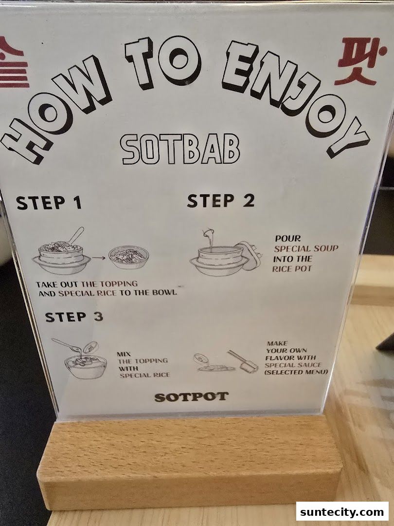 A sign from SOTPOT explaining how to enjoy their SOTBAB dish in three steps.