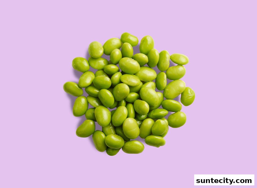 A pile of fresh, green edamame beans on a light purple background.