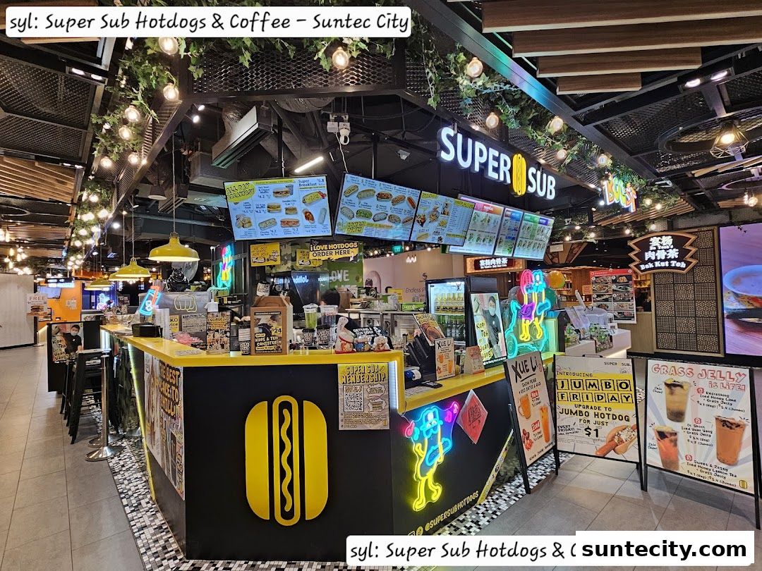 A brightly lit Super Sub hotdog and coffee shop counter with menu boards and promotional signs.