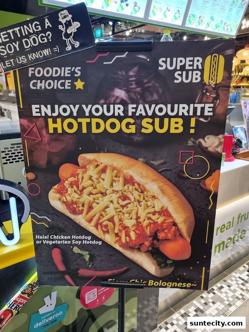 A promotional poster for Super Sub Hotdogs featuring a large hotdog sub with bolognese sauce and cheese.
