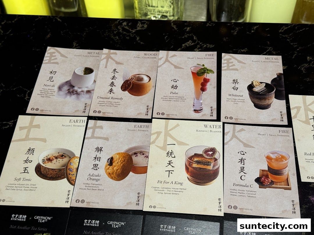 A collection of cards showcasing unique cocktails with ingredients and names.