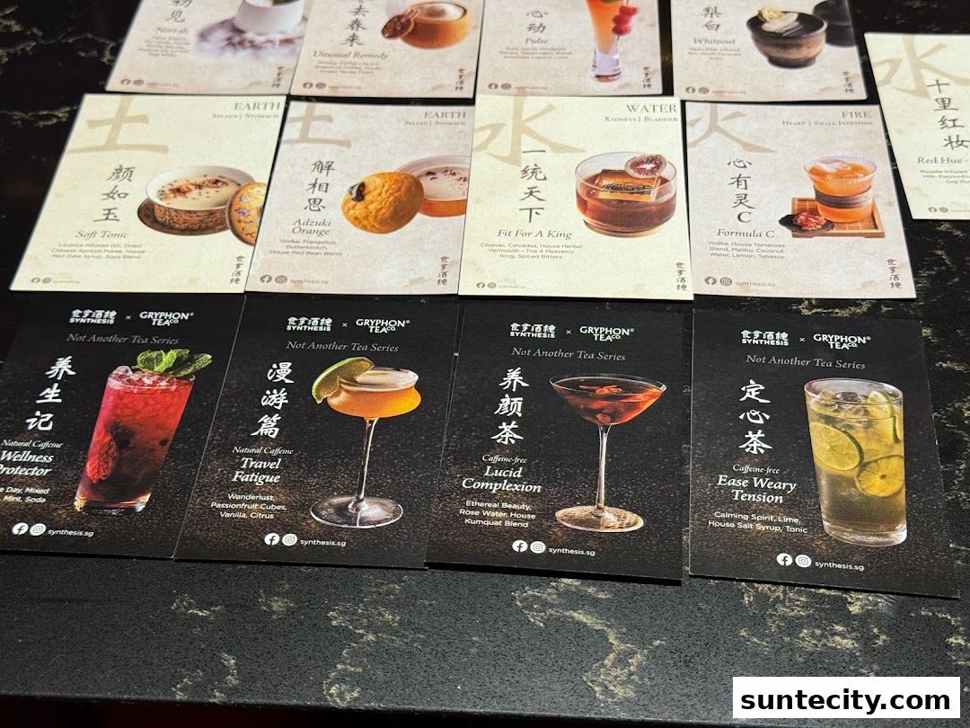 A collection of cards showcasing unique cocktails and traditional Chinese medicine-inspired drinks.