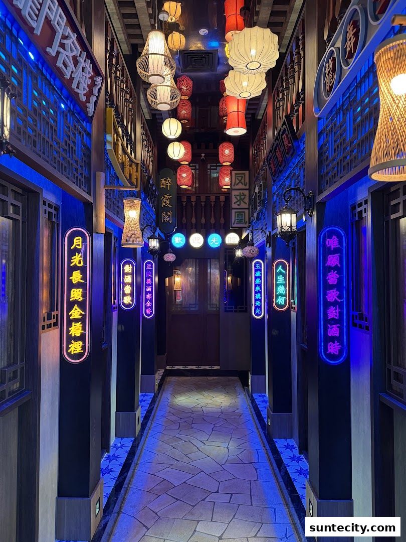 A dimly lit hallway with traditional Chinese lanterns and neon signs.