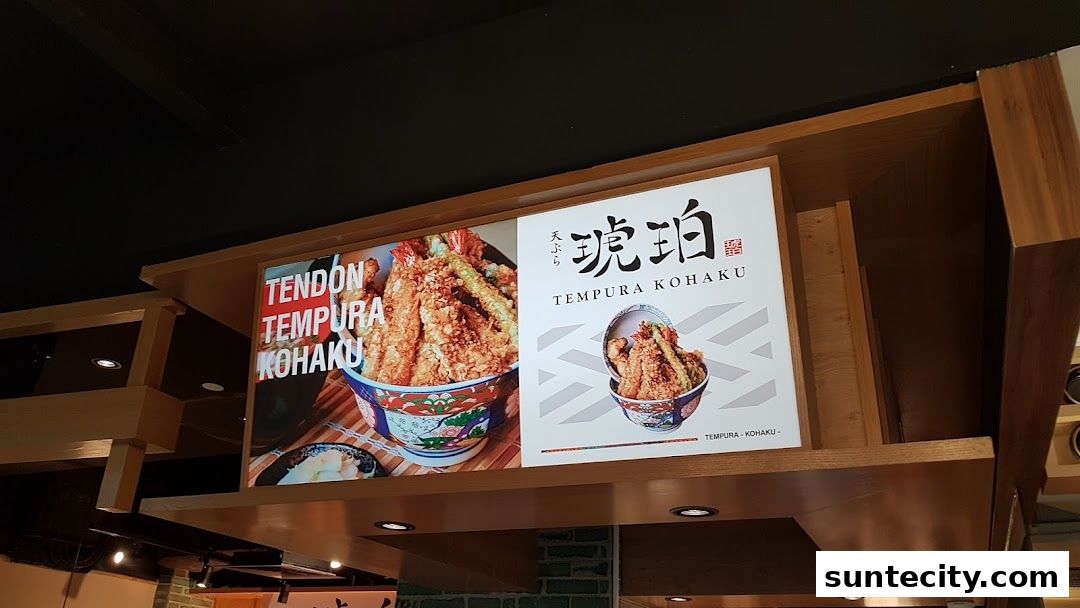 Signs displaying delicious tempura bowls from Tendon Kohaku.