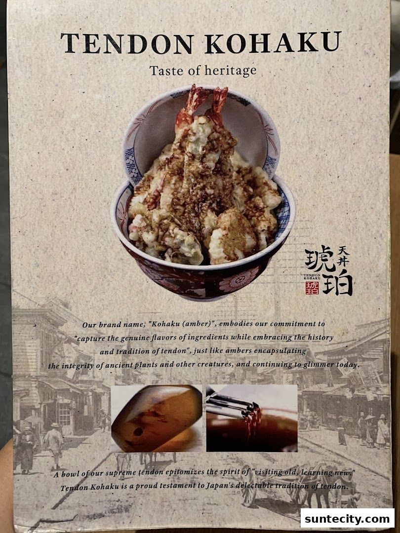 A promotional image for Tendon Kohaku, featuring a bowl of tempura and descriptive text.