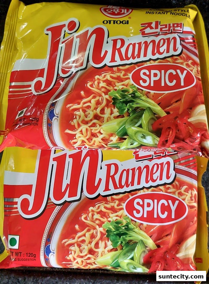 Two packages of Ottogi Jin Ramen Spicy Korean style instant noodles.