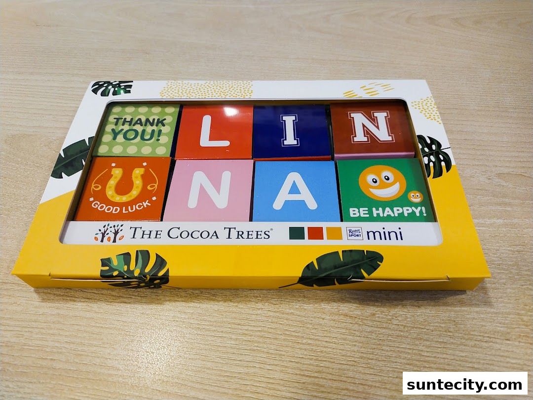 A box of Ritter Sport mini chocolates with personalized messages and letters.