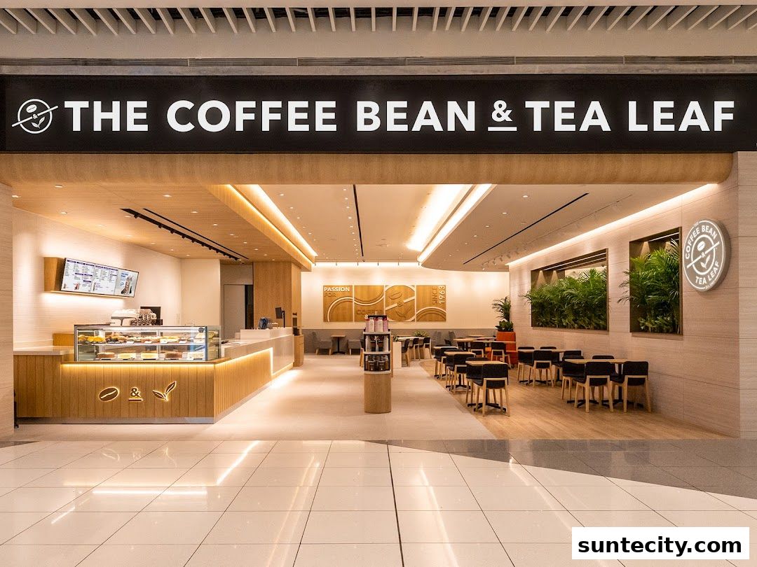 The Coffee Bean & Tea Leaf shop entrance with seating area and display counter.