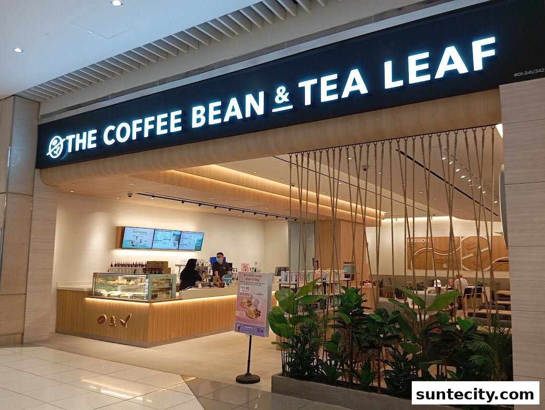The Coffee Bean & Tea Leaf shop front with a counter, display cases, and seating area.