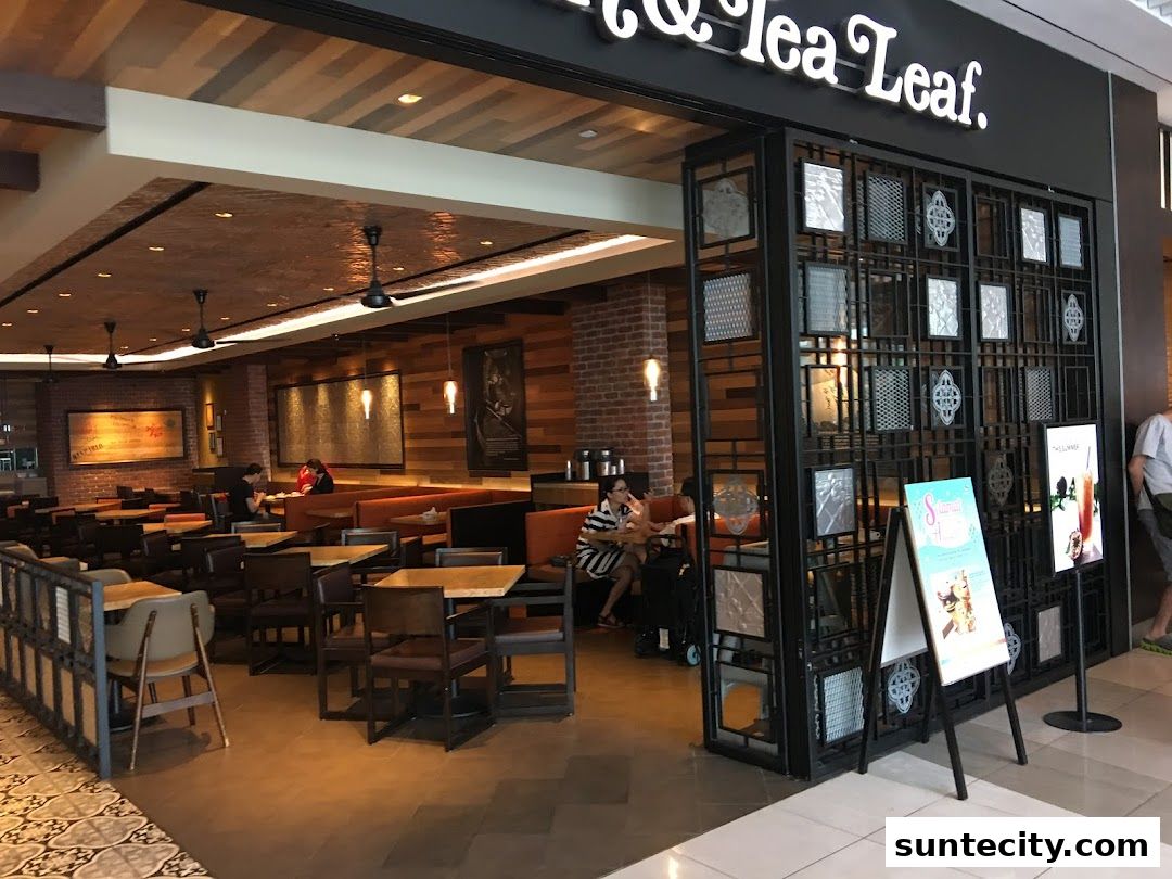The Coffee Bean & Tea Leaf shop interior with seating and decorative elements.