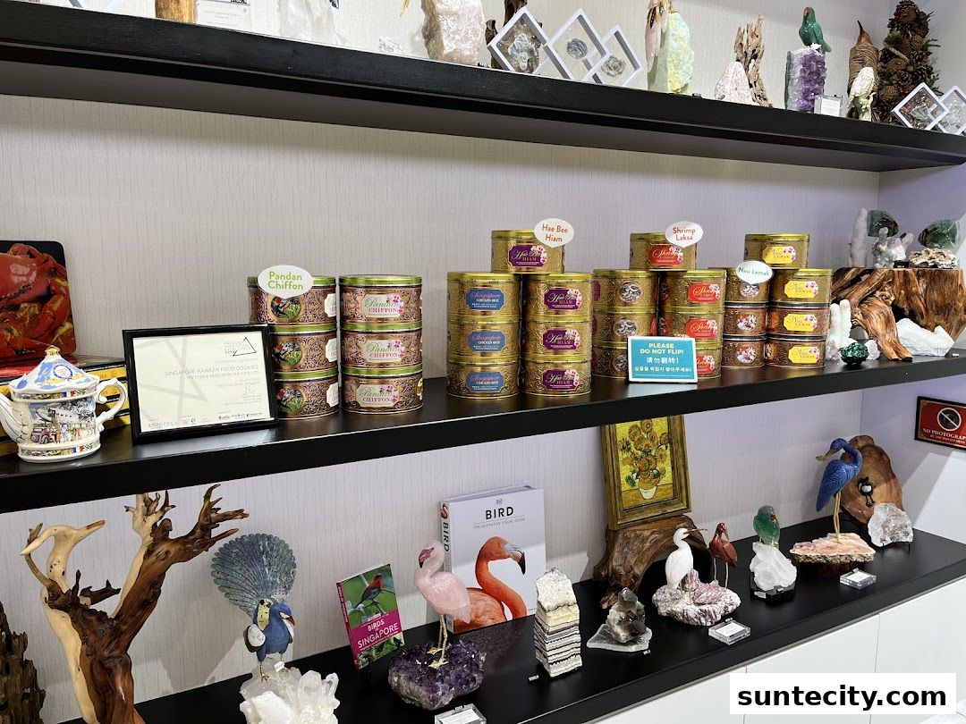 Shelves display tins of cookies and various decorative items, including crystals and figurines.
