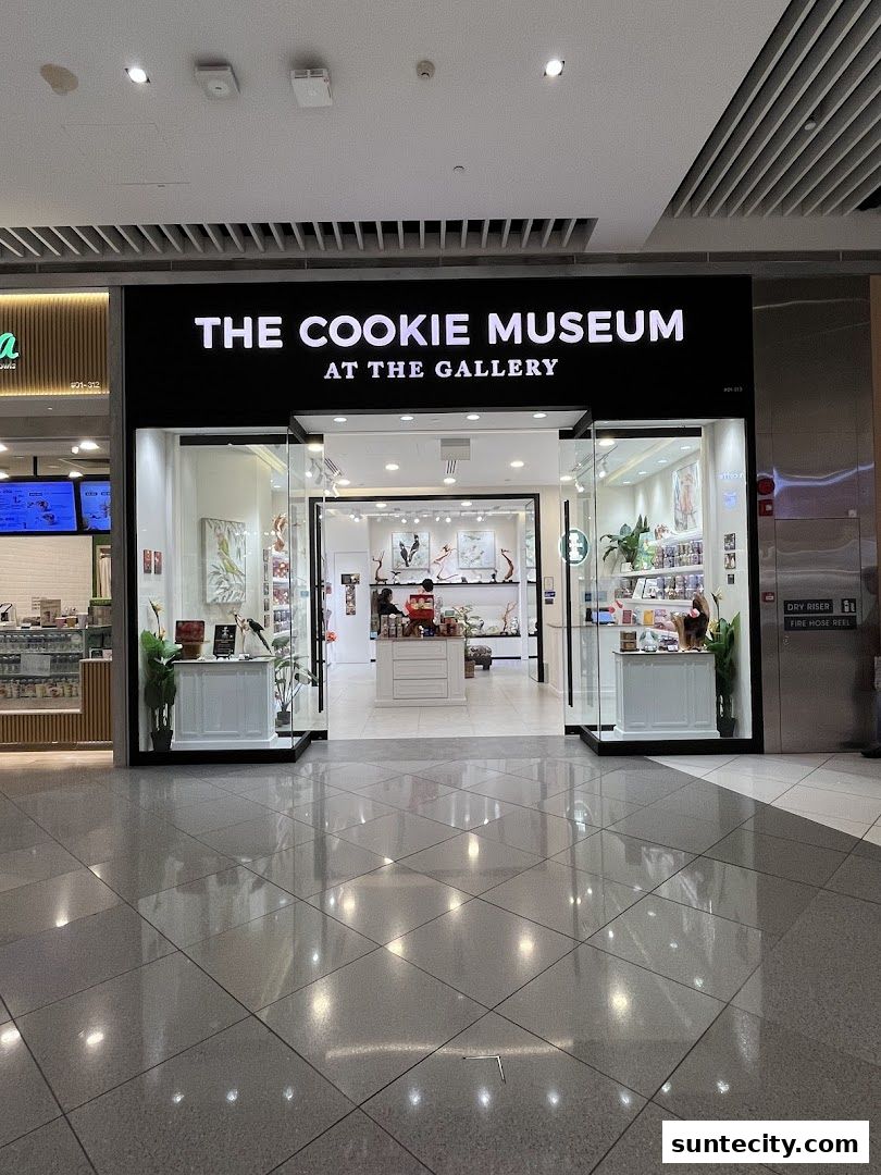 The Cookie Museum at The Gallery shop front with display cases and products visible inside.