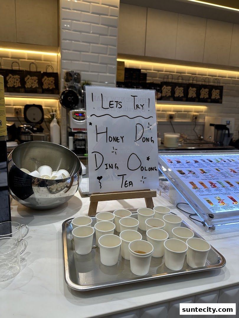 A display of sample cups of Honey Dong Ding Oolong Tea at The Whale Tea.