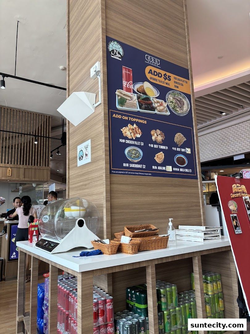 A promotional poster for Lanzhou Beef Noodles with add-on toppings and set meal upgrades.