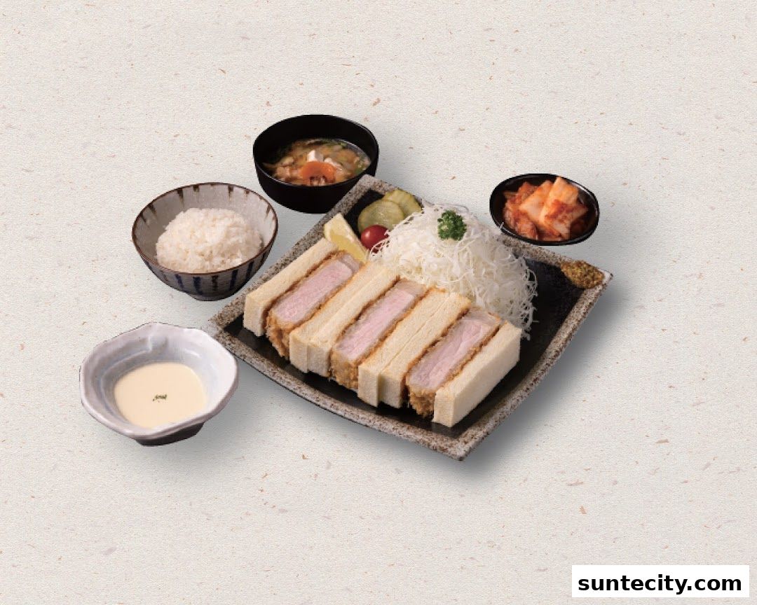 A delicious Tonkatsu sandwich set with rice, soup, and kimchi.