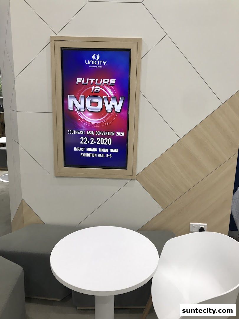 A digital display advertises the Unicity Southeast Asia Convention 2020.