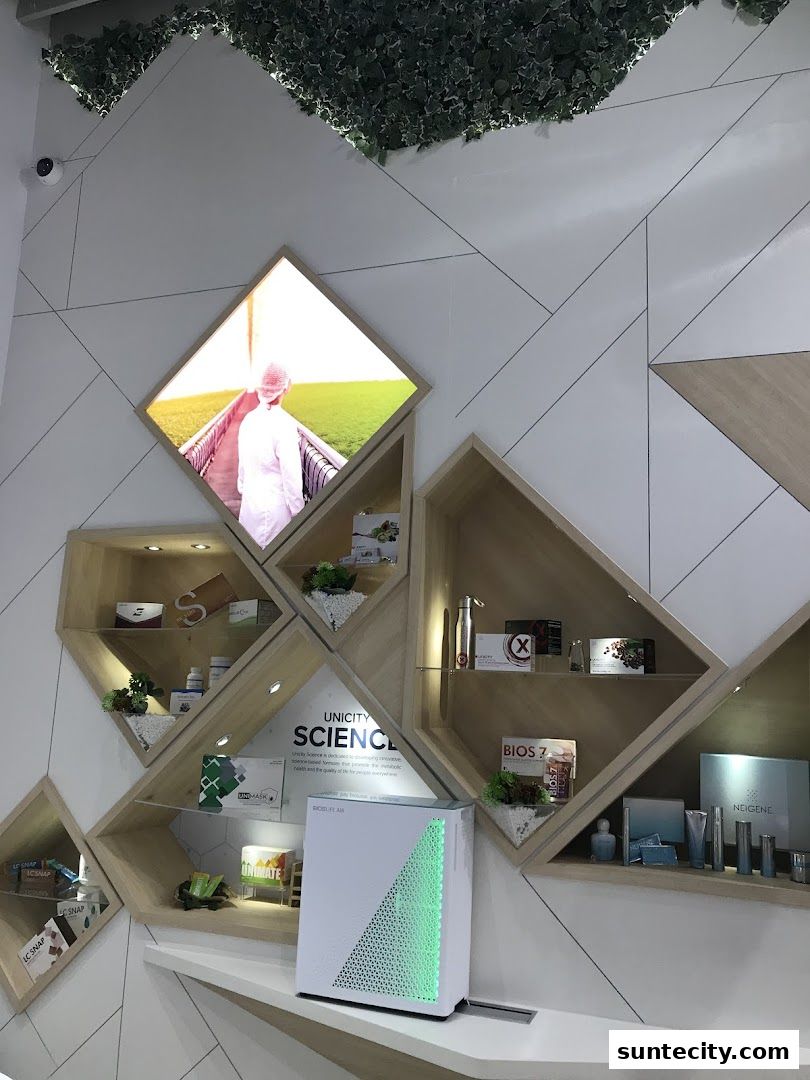 A modern retail display featuring health and wellness products from Unicity.