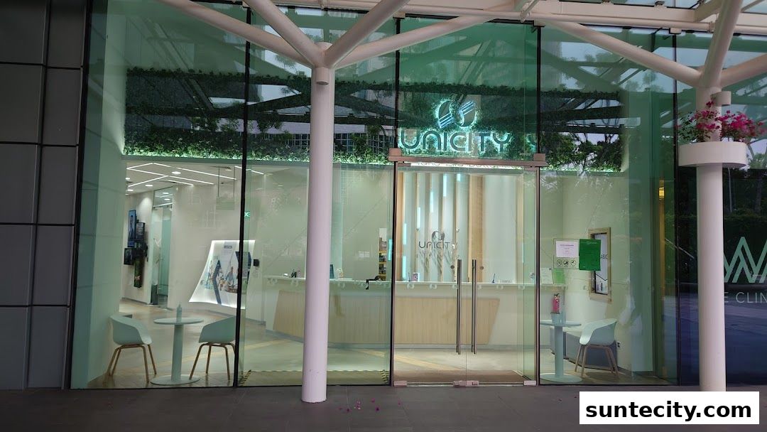 The modern entrance of Unicity, a clinic with a clean, bright interior and a welcoming seating area.